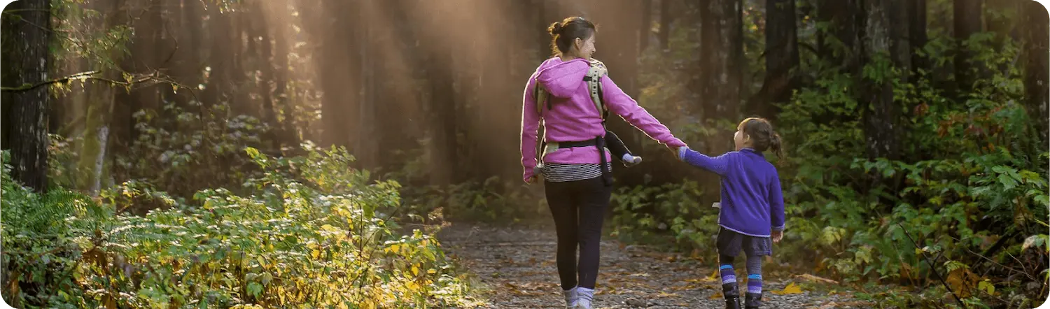 Woman standing in the middle of a grass field
