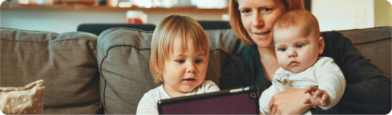 Woman with a child and a newborn baby