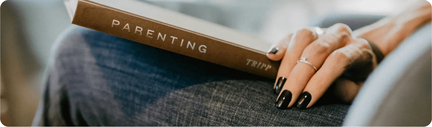 Woman standing in the middle of a grass field